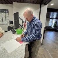 Verlan completing the necessary paperwork at the Williams County Auditor's Office on March 24 to officially appear on the ballot for the Primary Election (June 9).